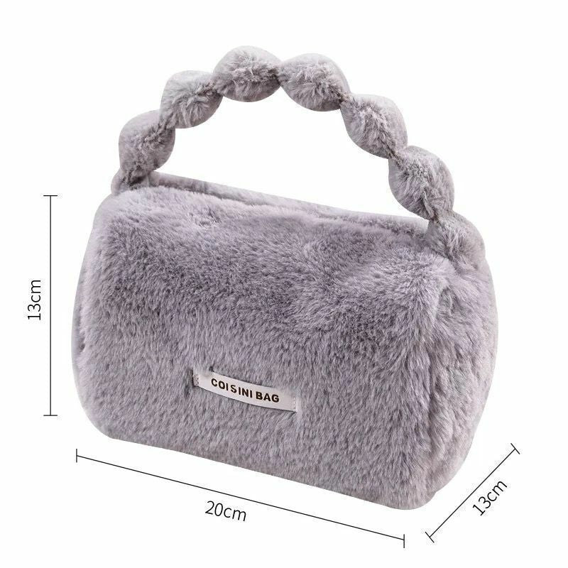 BOLSO DE MANO PELUDO