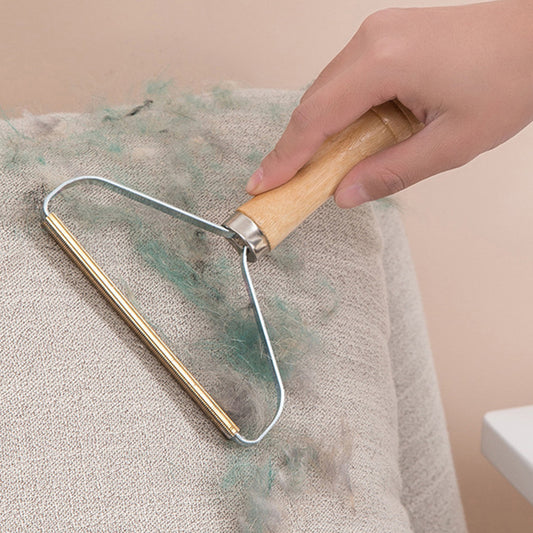 Sacapelusas mango madera